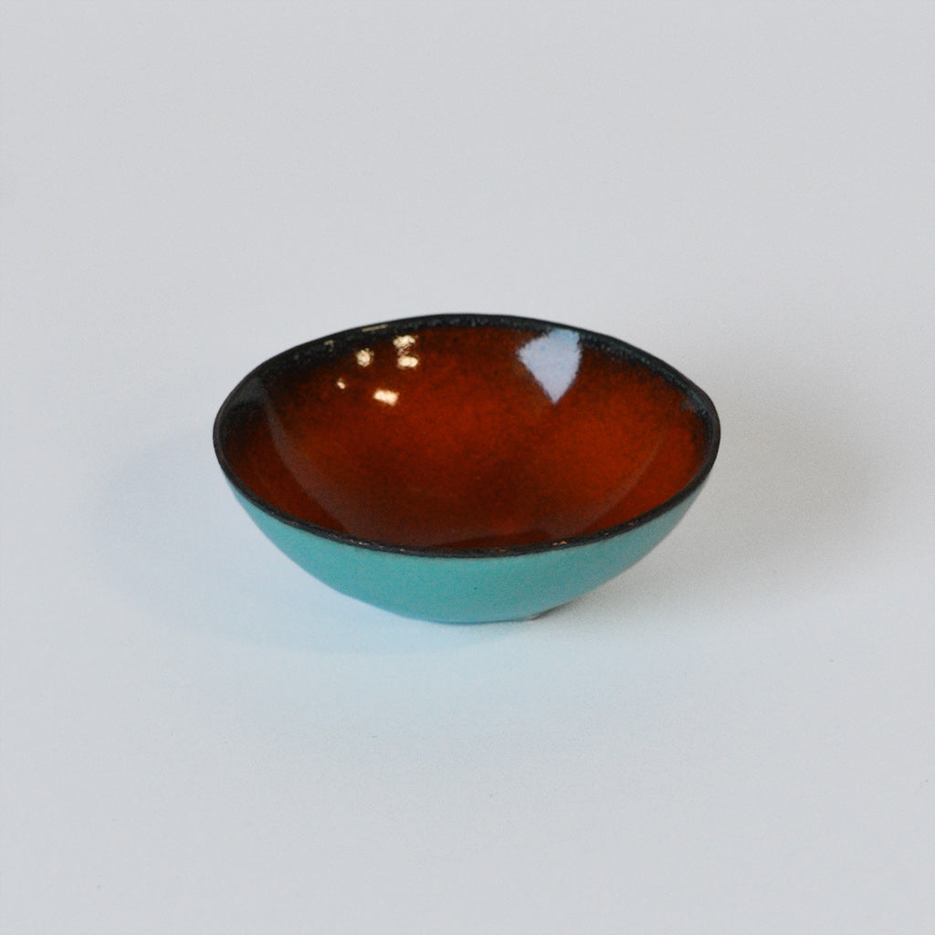 https://www.catherinegrisez.com/cdn/shop/products/orange-bitty-bowl_CG-Sculpture-Jewelry_6771_1200x.jpg?v=1632194166